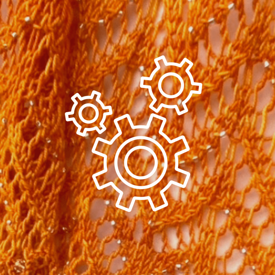 gear on knitted background
